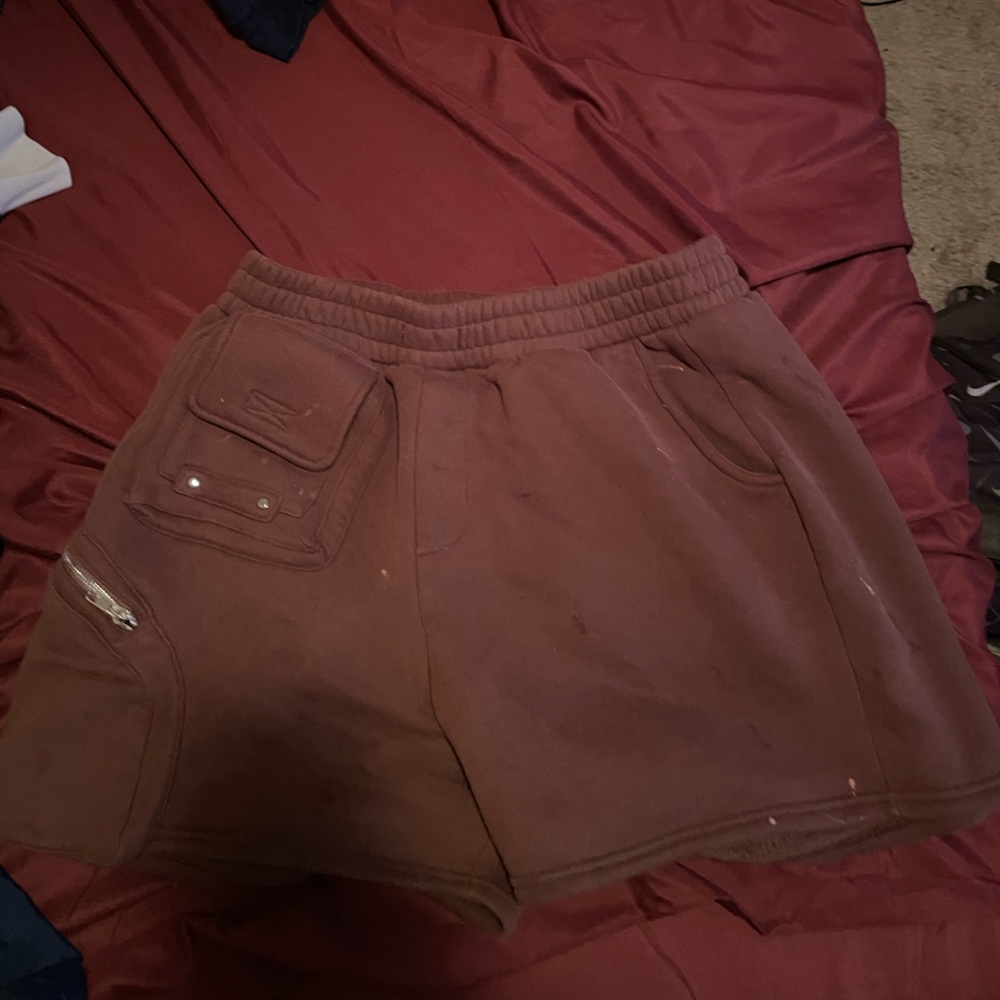 Brown sweatpants material shorts with extra side pockets